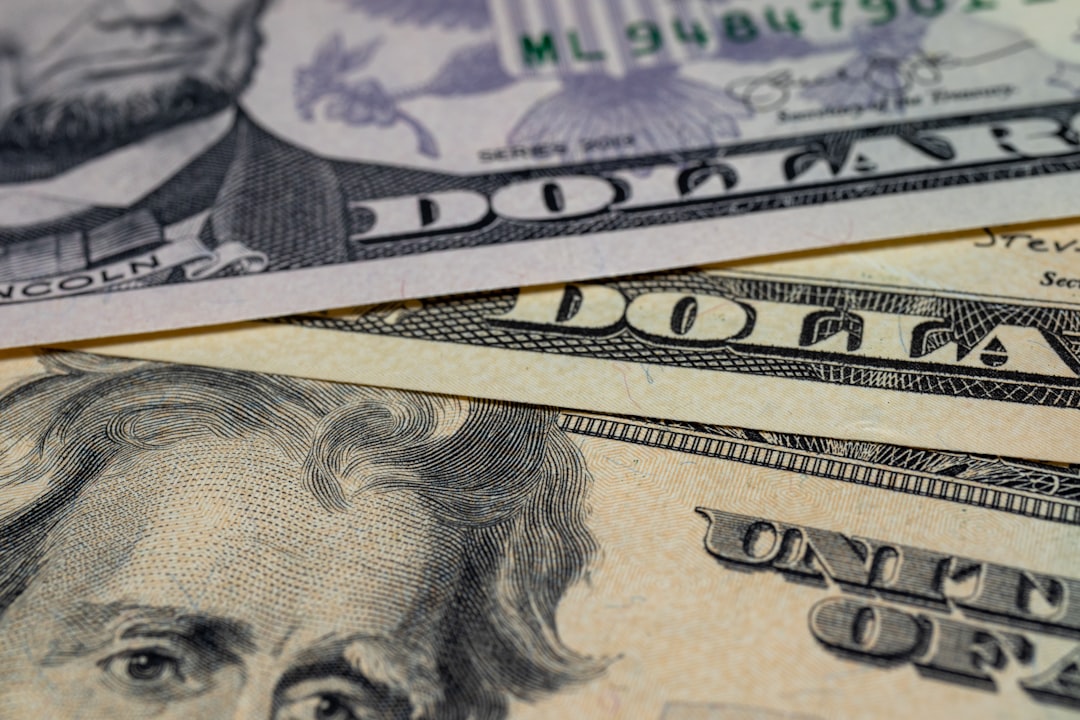 Pile of five, ten and twenty dollar bills
